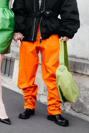 Milan, Italy - June, 19, 2022: man wears green Prada bag, street style accessories.のeditorial素材
