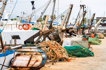 La Spezia, Italy - May, 18, 2021: fishing boat docked at harbor. Leisure activity, sport and...
