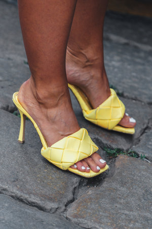 Milan, Italy - June, 18, 2022: woman wears Bottega Veneta lido sandals, street style accessories.のeditorial素材