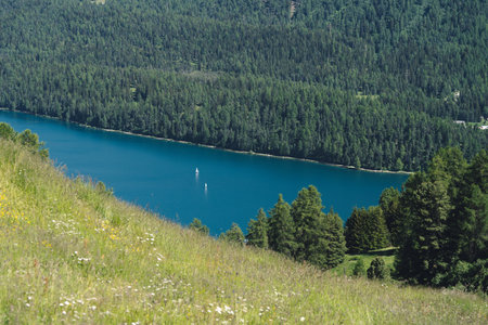 Switzerland, St.Moritz - June 6, 2023: aerial view to the city St. Morirz and lake on sunny summer day.のeditorial素材