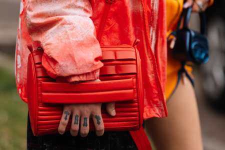 Milan, Italy - February 22, 2023: fashioner wearing Diesel Cruise shoulder bag. Fashion blogger outfit details, street styleのeditorial素材