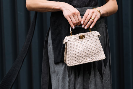 Milan, Italy - September 20, 2023: fashioner wearing Fendi Peekaboo ISeeU medium bag. Fashion blogger outfit details, street styleのeditorial素材