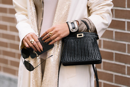 Milan, Italy - September 20, 2023: fashioner wearing Fendi Peekaboo ISeeU medium bag. Fashion blogger outfit details, street styleのeditorial素材