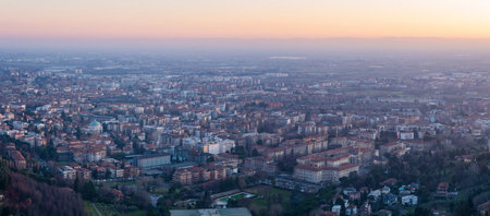 Panoramic view of cityscape Bergamo, aerial view to the city in the mountain valley, Lombardy, Italy.の写真素材
