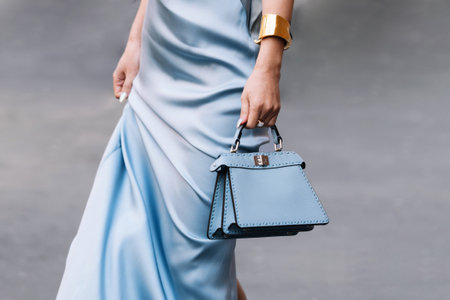 Milan, Italy - February, 21, 2024: woman wears Fendi Peekaboo bag, fashion blogger outfit details, street style.のeditorial素材