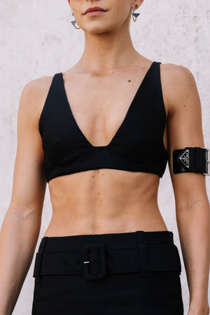 Milan, Italy - June 19, 2022: woman wears Prada accessory, fashion blogger outfit details, street styleのeditorial素材