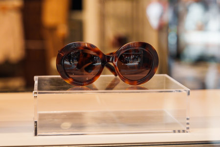 Milan, Italy - 24.04.2024: Gucci glasses at the showcase at shopping gallery in the center of Milan, Galleria Vittorio Emanuele, vitrine of the shopのeditorial素材