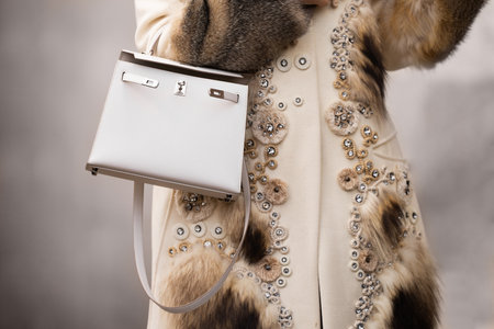 Paris, France - February, 29, 2024: woman wears Hermes Kelly bag, fashion blogger outfit details, street style.のeditorial素材
