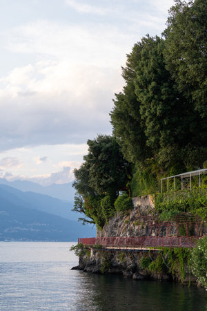 Peaceful lakeside village captured at sunset at Varenna, lake Como, Italyの写真素材