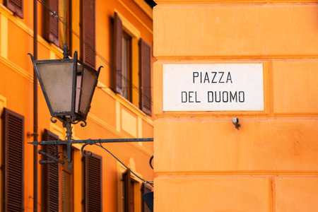 Old vintage style street lamp hanging at the street in city, Italy. Light lamp with metal frameの写真素材