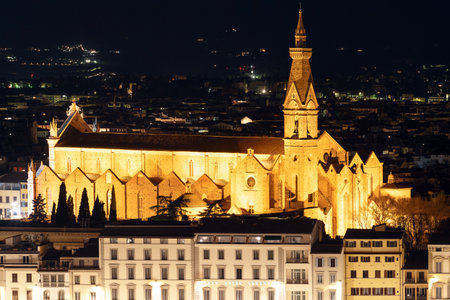 Night panoramic view of Basilica Holy Cross, and illuminated buildings. Florence, Tuscany, 12 Jan 2022の写真素材