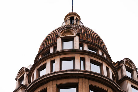 Historical architectural dome against clear sky for urban design inspiration in Paris.の写真素材