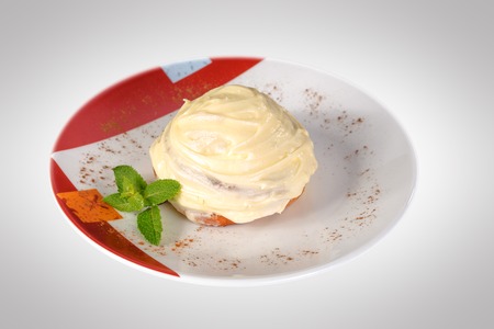 very tasty Cakes with cream on plateの写真素材