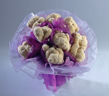 Bouquet of beautiful toys on a colored backgroundの写真素材