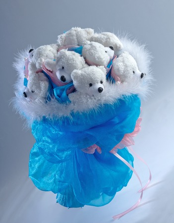 Bouquet of beautiful toys on a colored backgroundの写真素材