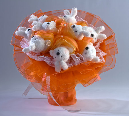 Bouquet of beautiful toys on a colored backgroundの写真素材