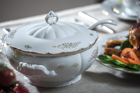 Beautifully decorated table with food and utensilsの写真素材