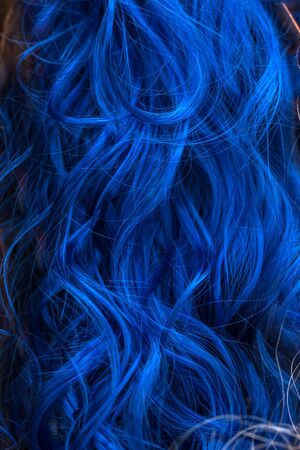 beautiful blue hair on a black backgroundの写真素材