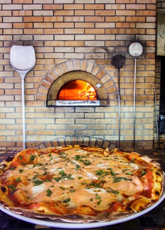 very tasty pizza fresh from the ovenの写真素材