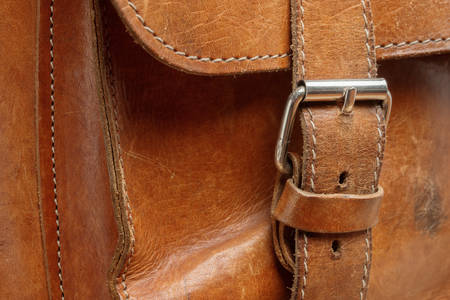 Vintage leather bag background in good conditionの写真素材