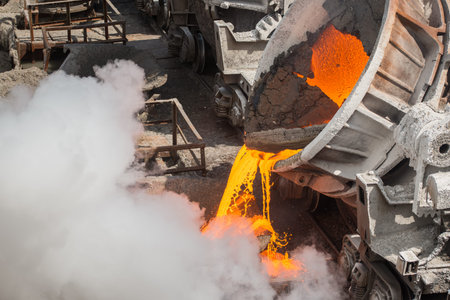 very hot steel pouring in steel plantの写真素材
