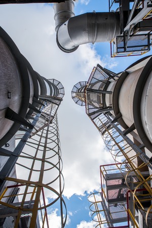 Ferroalloy plant and blue sky with cloudsの写真素材