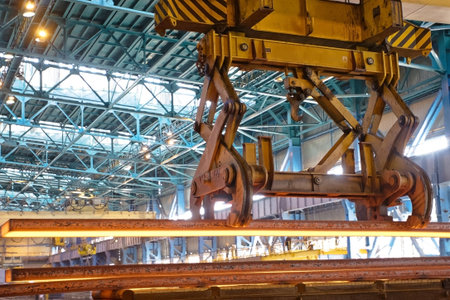 Process of manufacturing metal. Crane carries metal at the plant