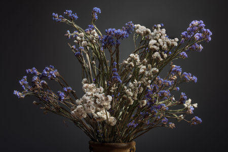 isolated bouquet of flowers in old vaseの写真素材