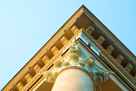 House with Roman column detail over blue sky viewの写真素材