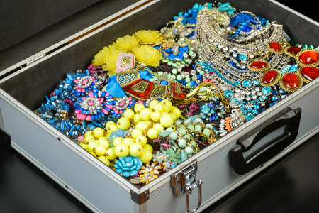 bijouterie collection in aluminium briefcase on black backgroundの写真素材