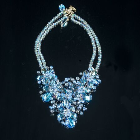 necklace on a black background in close upの写真素材