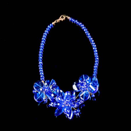 necklace on a black background in close upの写真素材