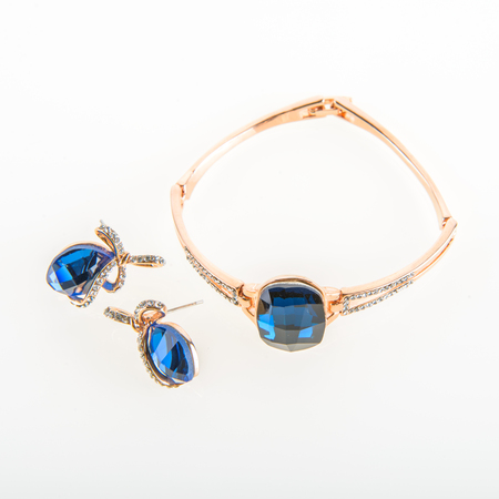 jewelry expensive bracelet and earrings on white backgroundの写真素材