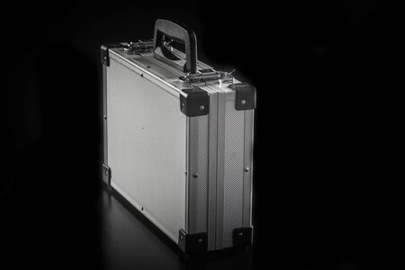 Aluminum metal case box on black backgroundの写真素材