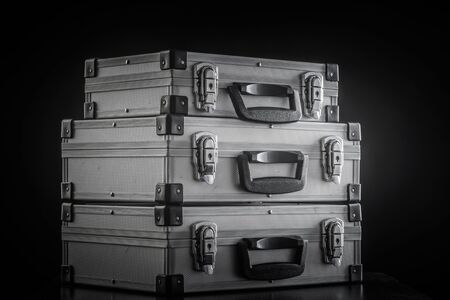 Aluminum metal case boxes on black backgroundの写真素材