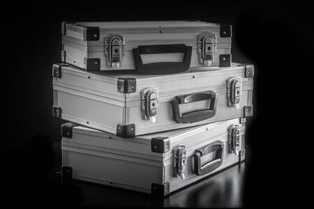Aluminum metal case boxes on black backgroundの写真素材
