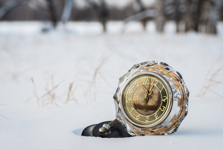 New Year's   retro clock in the snow,close upの写真素材