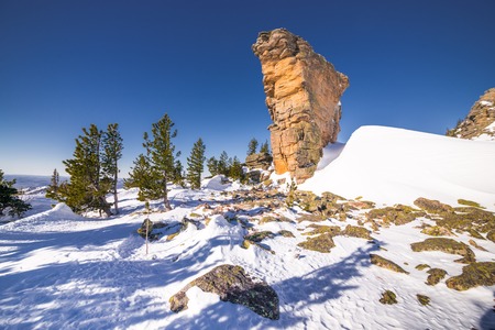 sunny and beautiful rocky Mountain in winter snowの写真素材