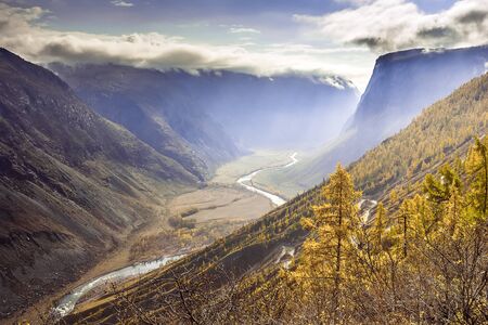 Beautiful landscape with river in the valley in autumnの写真素材