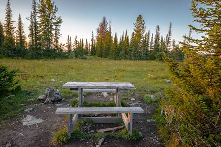 summer mountain landscape with benches on the top of ridgeの写真素材