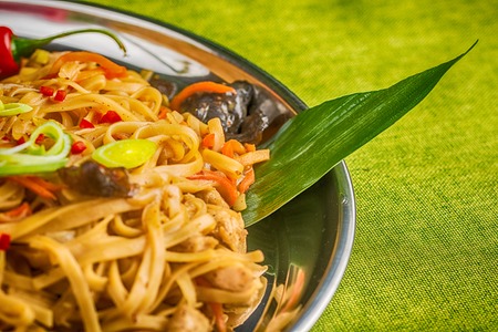 Asian noodles with mushrooms, herbs and chiliの写真素材