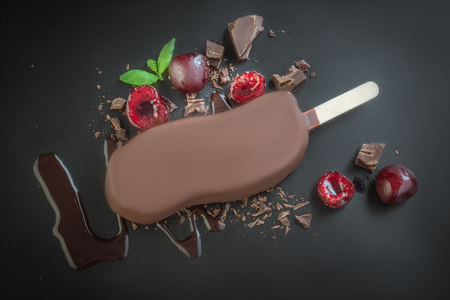 tasty ice cream in milk chocolateの写真素材