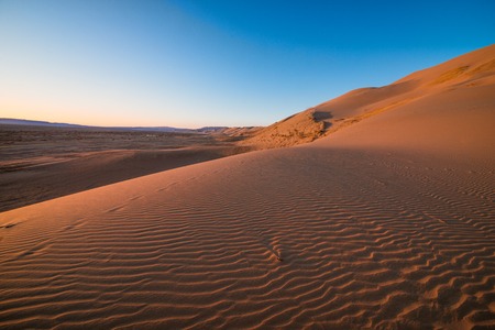 magnificent sandy waves on dunes in desertの写真素材