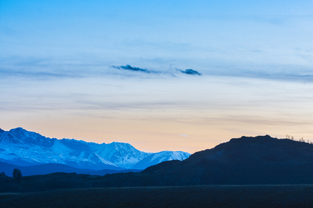 landscape of snow-covered mountainsの写真素材