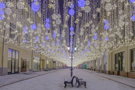 Christmas and New Year decoration with illumination Nikolskaya street in Moscow city. Beautiful night view with no people.の写真素材