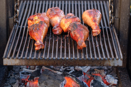 Barbecue turkey's legs on the open grill.の写真素材