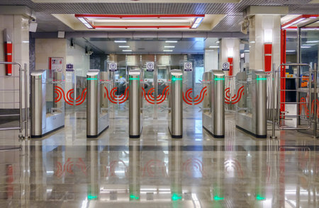 Russia, Moscow, 30.05.2018: Modern turnstile in moscow subway with green led light.