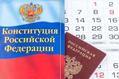Moscow - 22 march 2020: Constitution of the Russian Federation with passport citizen on calendar background.のeditorial素材