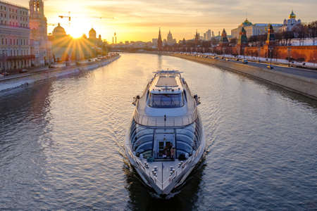 Moscow - 16 February 2019: Colorful evening landscape with view on kremlin embankment and moscow river.のeditorial素材