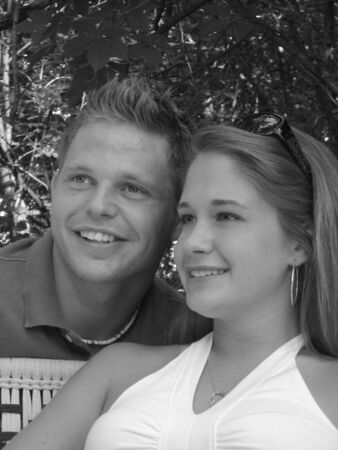 Beautiful couple looking off into the distance. Black and White.の写真素材